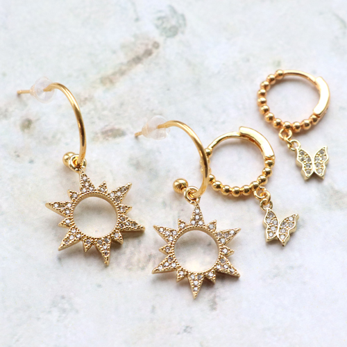 Pendientes y pulseras de tendencia con colgantes y entrepiezas con zirconia: