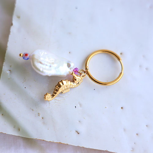 Crea alegres pendientes con criollas de acero inoxidable con ojal