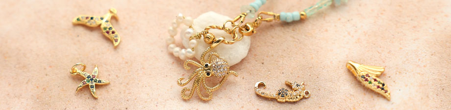 &iexcl;S&iacute;! Descubre los nuevos colgantes met&aacute;licos TQ lat&oacute;n